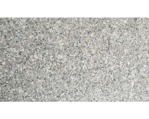 Nahaufnahme einer Granitoberfläche mit gesprenkelter Struktur.