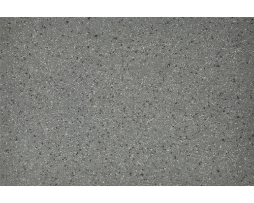 Gesprenkelte Oberfläche einer Bodenfliese oder Terrassenplatte in Steinoptik.