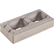 Schalungsstein aus Beton mit zwei Kammern für Mauerwerk.