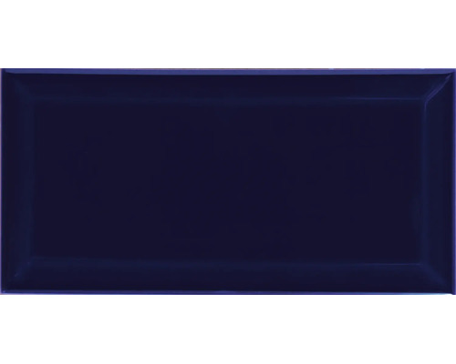 Blaue, rechteckige Wandfliese mit Facette und glänzender Oberfläche.