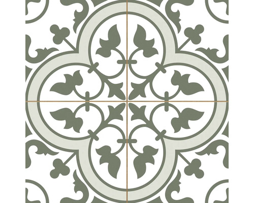 Dekorfliese mit symmetrischem Ornamentmuster aus Blättern und Ranken, das ein zentrales kreisförmiges Motiv bildet.