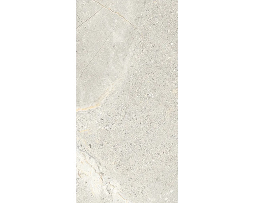 Fliese in Terrazzo Optik mit feiner Körnung und angedeuteten Steinadern