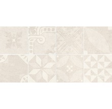 Muster von acht beigen Zementfliesen mit verschiedenen Designs