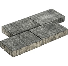 Vier graue Pflastersteine aus Beton