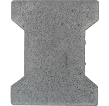 Grauer Pflasterstein in Knochenform