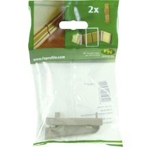 Zwei Sockelleisten Eckstücke in einer Kunststoffverpackung.