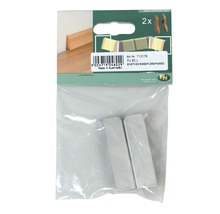 Zwei Befestigungskeile aus Metall in einer transparenten Verpackung