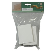 Verpackung mit zwei weißen Sockelleisten-Ecken