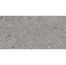 Graue Betonstruktur mit unregelmäßiger Oberfläche