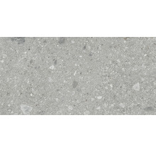 Nahaufnahme einer Betonpflasterplatte mit rauer Oberfläche