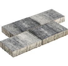 Vier graue Pflastersteine aus Beton