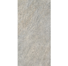 Nahaufnahme einer hellen Natursteinfliese mit matter Oberfläche.