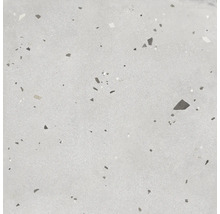 Nahaufnahme einer Bodenfliese mit Terrazzomuster