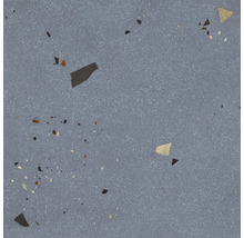 Nahaufnahme einer Bodenfliese mit Terrazzo-Muster.