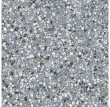 Nahaufnahme einer Terrazzo-Fliese mit grauer Grundfarbe und diversen Steineinschlüssen.