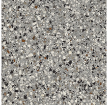 Nahaufnahme einer Bodenfliese mit Terrazzo-Muster