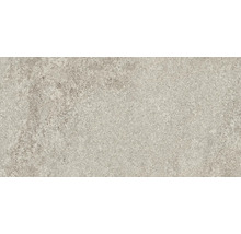 Nahaufnahme einer beigen Fliese mit gesprenkelter Textur für Boden oder Wand