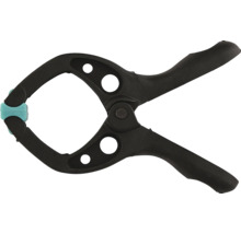 Federzwinge aus Kunststoff mit beweglichen Schutzbacken