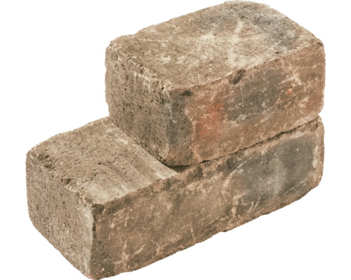 Zwei Pflastersteine aus Beton gestapelt