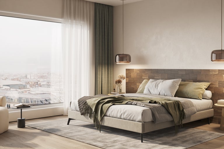 Schlafzimmer mit Bett, Nachttisch und Fenster